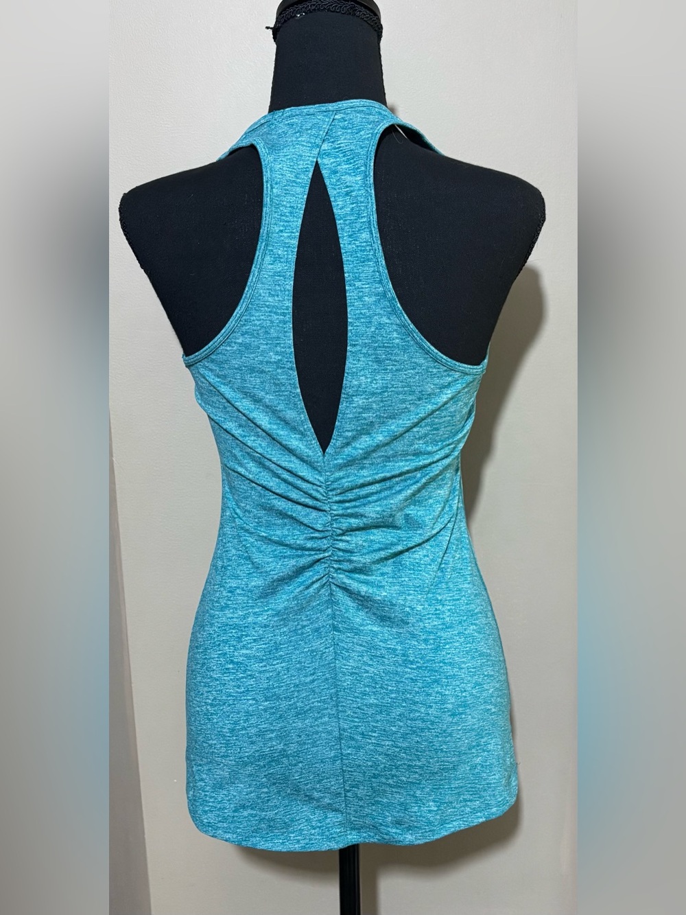 Patagonia size S cut out back tank top. EUC. Heather teal color.